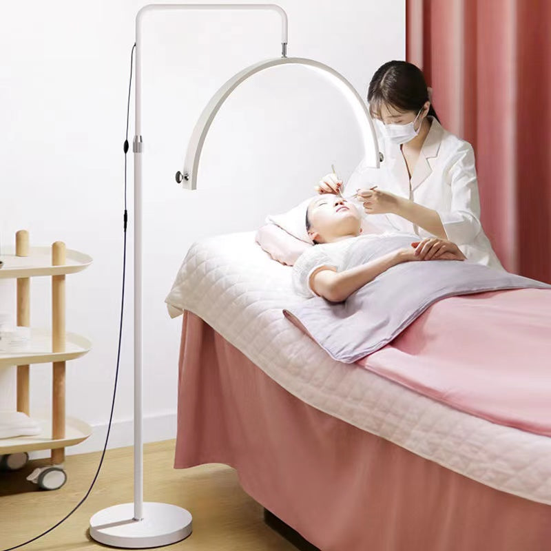 Lámpara de pie con protección ocular en forma de U